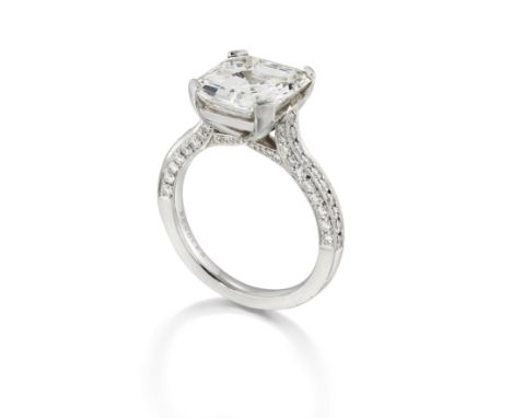 BOODLES: DIAMOND SINGLE-STONE RINGThe step-cut diamond, weighing 5.04 carats, in a pavé-set brilliant-cut diamond setting, mo