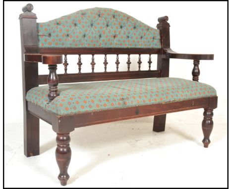 A 20th Century Victorian style /&nbsp; gothic revival oak framed hall settle, button back embroidered upholstered seat pad an