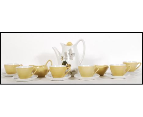 A mid 20th Century 1960's coffee service by Midwinter Stylecraft in the Nuts In May pattern designed by John Russell. The set