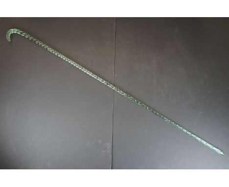 19th Century Nailsea green glass walking cane of spiralling twisted form, approx 116cm long 