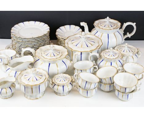 Early 20th Century Furstenberg porcelain tea set of scalloped form, decorated with blue &amp; gilt stripes, pattern no. A66, 