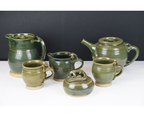 Deverill Pottery green glazed tea set for two, with handles modelled as lizards, to include teapot, water jug, 2 mugs, milk j