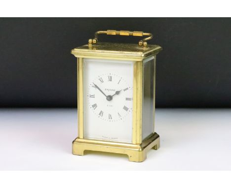A French Bayard brass cased carriage clock with beveled glass panels. 