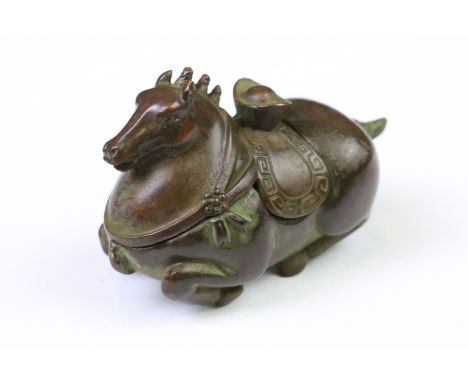 A Chinese copper writing brush / pen washer statue in the form of a horse, removable lid, measures approx 8.5cm x 6cm. 