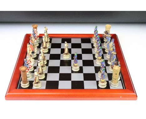 A contemporary 'The Chessmen' hand painted chess set. 