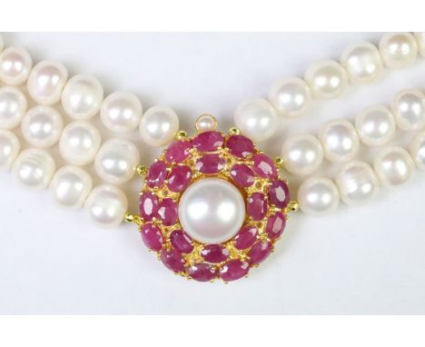 Three row freshwater pearl necklace with ruby clasp 