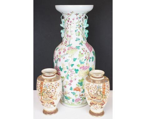 Large Chinese Famille Rose baluster vase with floral decoration, twin handle mounts modelled as lion-type create, seal mark t