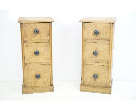 Pair of light oak bedside chest of three drawers, 31cm wide x 27cm deep x 68cm high 