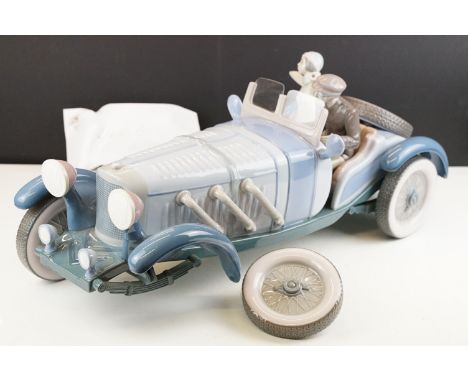 Large Lladro ' High Speed ' porcelain model, no. 1779, with driver &amp; female passenger, measures approx 60cm long. (Shows 