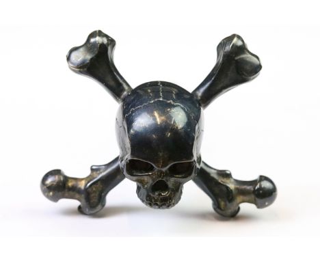 A designer 'Stephen Einhorn' Gothic Skull corkscrew, blackened brass head with red crystal eyes, hardened steel screw, stampe