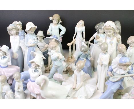 Extensive collection of Spanish Nao figurines to include single figures and groups, as well as swan figurines. Approx 31 in t