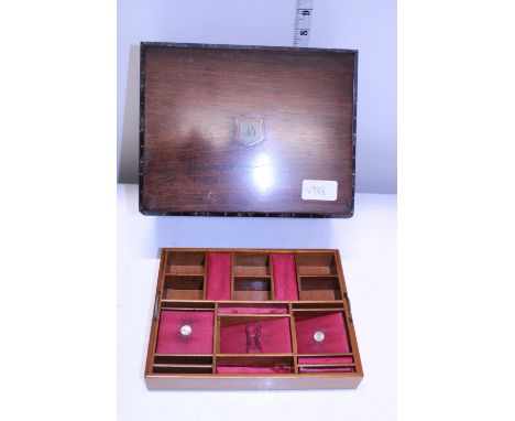 A vintage wooden sewing box with key 