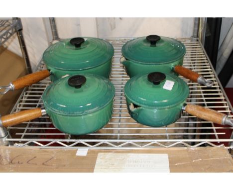 Four vintage Le Creuset cast iron pans 
