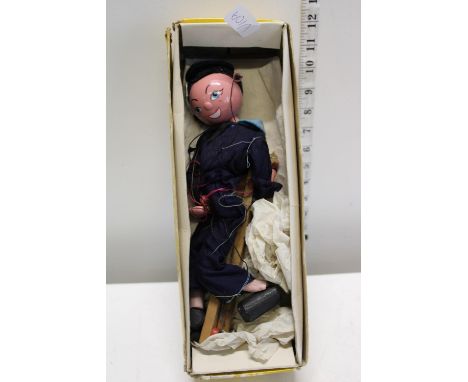 A vintage boxed Pelham puppet 