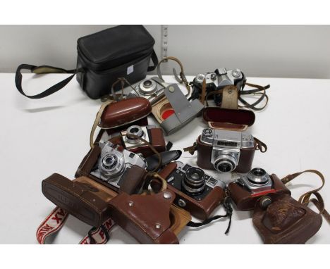 A job lot of assorted vintage cameras and accessories 