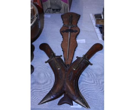 A Indian knife and fork set and wall hanging miniature sword 