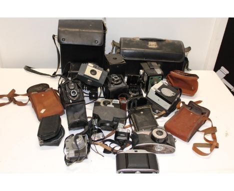 A job lot of assorted vintage cameras and accessories 