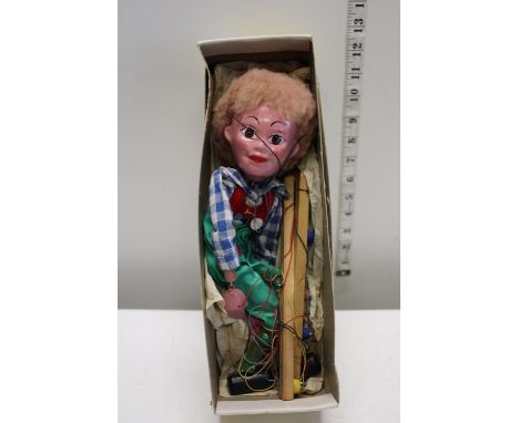A vintage boxed Pelham puppet 