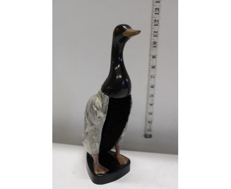 A vintage novelty shoe brush 