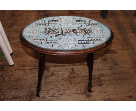 A vintage occasional table with beadwork top, postage unavailable 