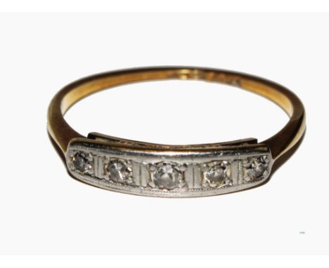 An Edwardian 18 carat gold five stone diamond ring