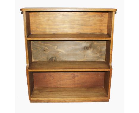 An early 20th century light oak free standing bookcase with three shelves, 80cm x 74cm