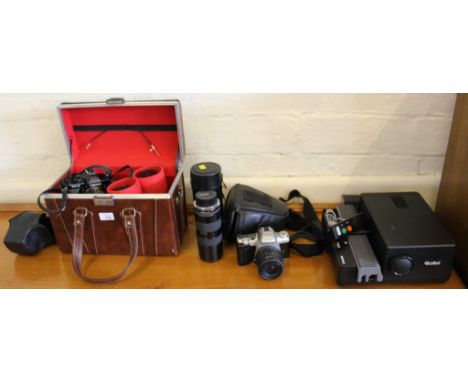 A selection of photographic equipment in carry cases, to include a Yashica FX3 camera with accessories and a Rollei slide pro