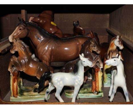 A selection of household ceramic figurines of horses