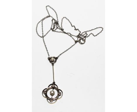 A fine quality Edwardian diamond and pearl pendant on white metal net chain, possibly platinum 