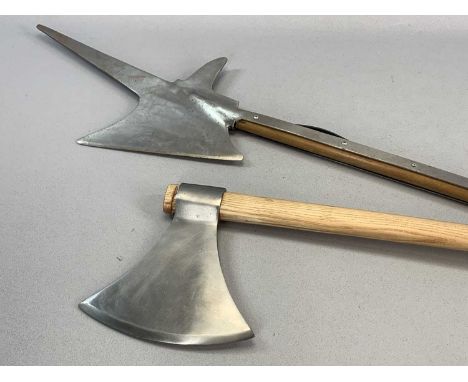 MEDIEVAL STYLE WEAPONRY, a double ended haslett, 163cms (l) and an axe, 96cms (l)Provenance: private collection Conwy