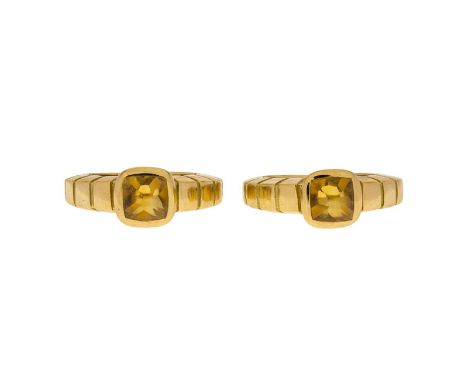 Van Cleef &amp	 Arpels	 attribuées à	 ensemble de 2 bagues en or 750 ciselé serties de citrine taille pain de sucre	 numéroté