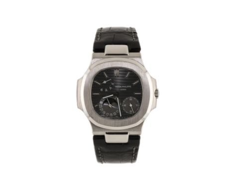Patek Philippe	 Nautilus	 montre en or gris phases de lunesSignée Patek Philippe	 réf. 5712G-001	 n°mouvement 31713307	 circa