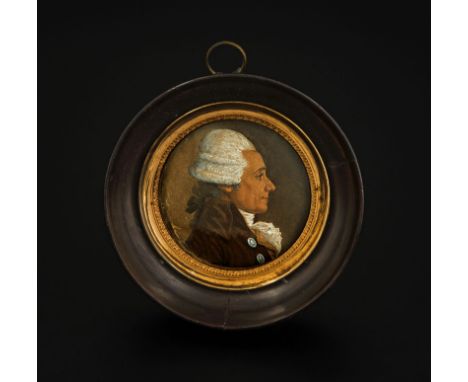 Miniature ronde peinte sur carton	 XIXe s	 représentant le portrait de profil d'un homme politique	 cerclé de métal doré	 dan