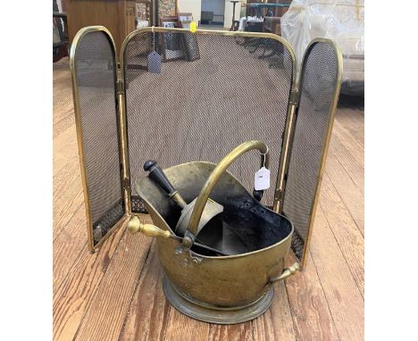 A brass folding fire screen, coal bucket and tongs 