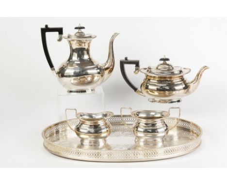 GARRARD & Co FOUR PIECE ELECTROPLATED TEA AND COFFEE SERVICE, of rounded oblong form with angular black scroll handles and pl