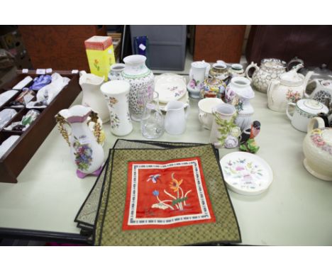 A SET OF TWELVE ORIENTAL EMBROIDERED TABLE MATS WITH SILK CENTRAL PANEL WITH FLORAL DECORATION, A MINTON 'HADDON HALL' VASE, 