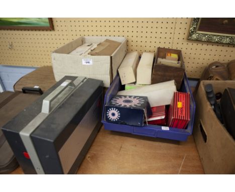 BOOTS COLORMASTER BOXED SLIDE PROJECTOR AND A LARGE SELECTION OF SLIDES AND SLIDE HOLDERS, INCLUDING  SMALL SELECTION OF GLAS