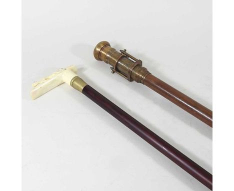 A compass/telescope walking stick, 99cm long, together with a bone handled walking stick (2)