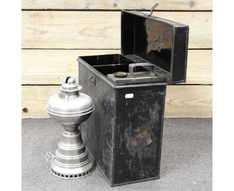 A Wanzer style clockwork kerosene lamp, 30cm high, in a metal boxGenerally dirty with wear to the plate on corners and edges 