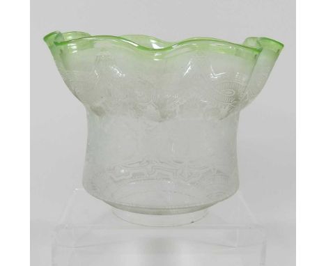 A green etched glass oil lamp shade, with a frilled rim, 18cm high