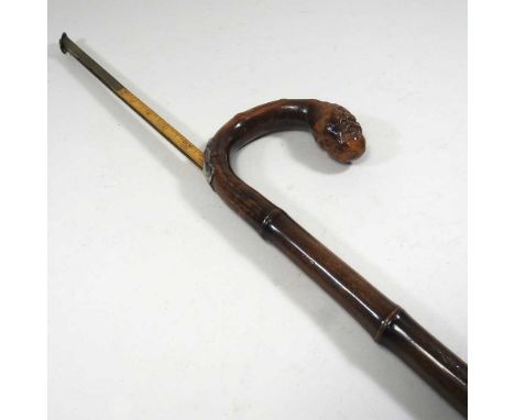 A Victorian silver mounted walking stick, containing a horse measuring stick, 92cm long