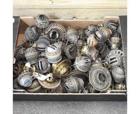 A box of oil lamp burners and parts