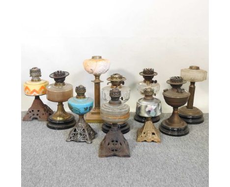 A collection of ten oil lamp bases, various designs (10)