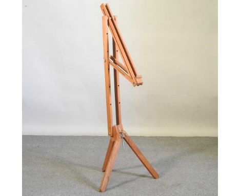 A wooden adjustable artist's easel