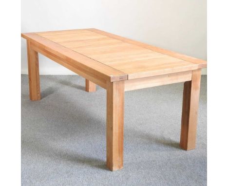 A modern light oak dining table, on square legs203w x 96d x 76h cm