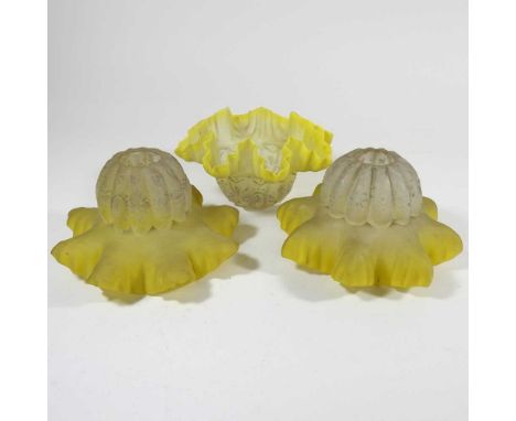 A pair of yellow glass shades, 15cm dia, together with another similarOverall, very dirty with light surface marks. Two have 
