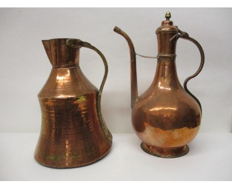 19th/20th Century Middle Eastern copperware comprising a coffee pot of bulbous form with a domed cover and brass finial, 14 1