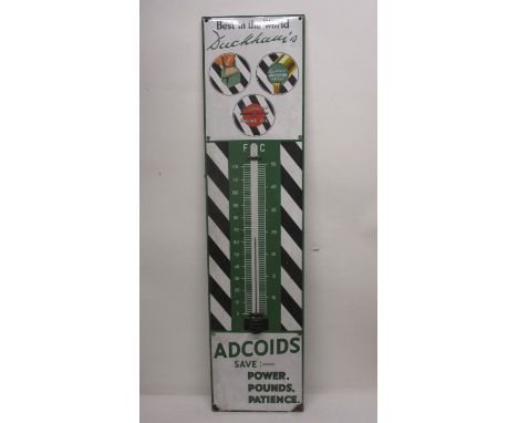 An enamelled metal Duckham's Adcoids Engine Oil advertising sing with a thermometer, 45" x 11" 