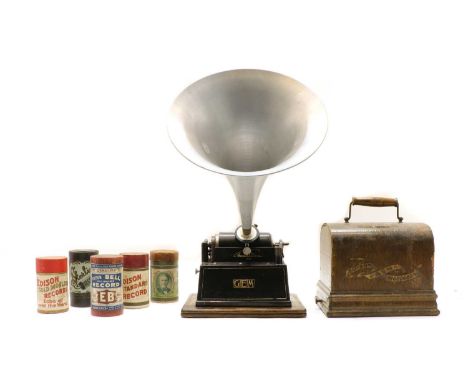 An Edison Gem phonograph with metal horn in oak case with cover, together with fourteen wax cylindersCondition report: box co