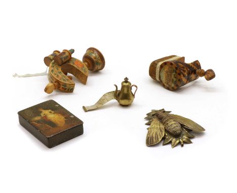 Sewing accessories and a box, comprising: two wooden clamp pin cushions, one inscribed 'A Brighton Trifle', with tape measure